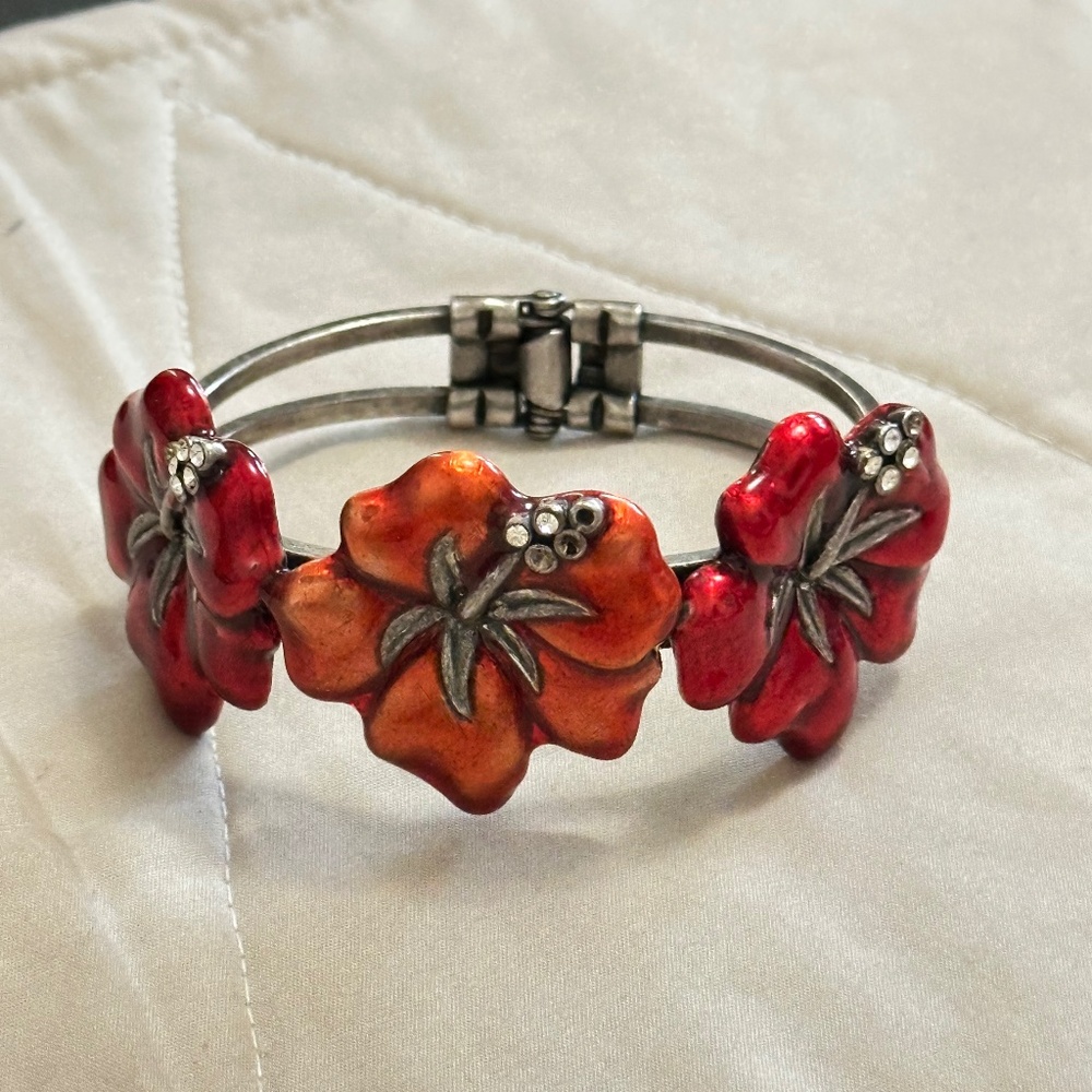 Vintage silver bangle bracelet with three hibiscus flowers, red and orange